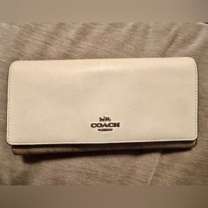 Coach large wallet. Cream and beige. In good condition.